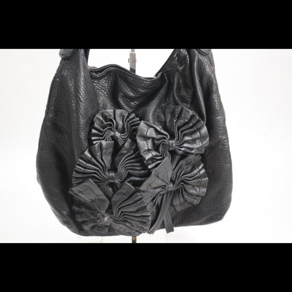 Marc Ecko black flower handbag